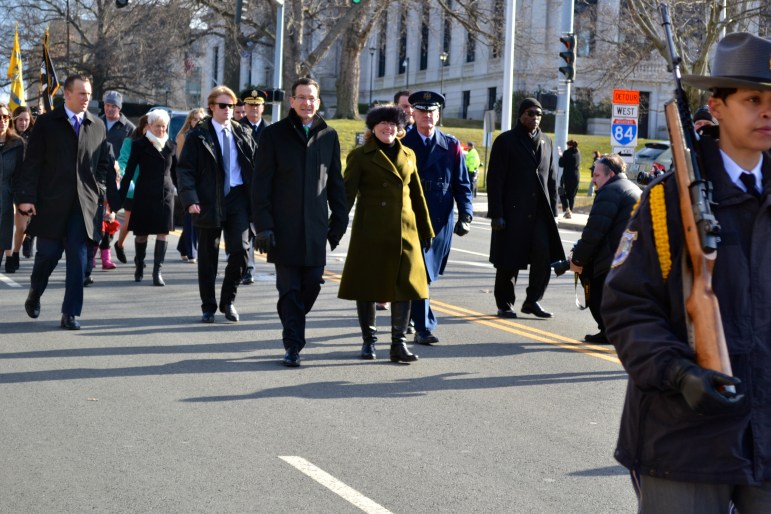 Gov. Dannel P, Malloy and wife, Cathy, marching to inaugural.