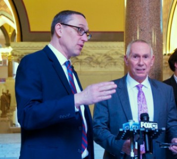 The governor's budget director, Benjamin Barnes, and chief of staff, Mark Ojakian, answering questions after the governor's budget speech Feb. 18.