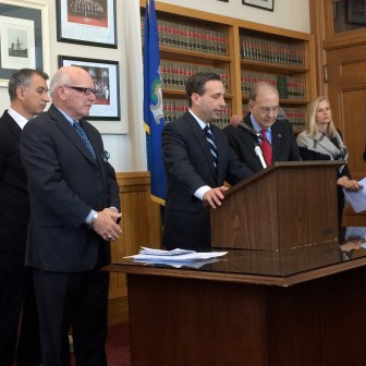 Senate leaders Bob Duff and Martin Looney, center, outline  a response to the Anthem breach.