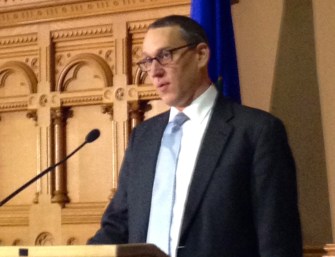 Benjamin Barnes, secretary of the Office of Policy and Management, speaks at the Benjamin Barnes, secretary of the Office of Policy and Management, speaks at the annual budget forum of Connecticut Voices for Children Tuesday.