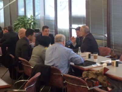 Foxwoods and Mohegan officials sit with their lobbyists in the Legislative Office Building cafeteria.
