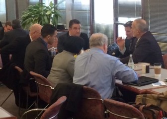 Foxwoods and Mohegan officials sit with their lobbyists in the Legislative Office Building cafeteria.