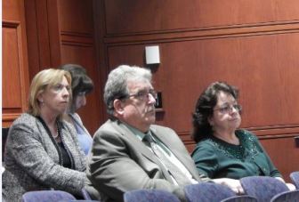 Heather Gates (left) and Raymond Gorman listen to Department of Mental Health and Addiction Services officials explain their budget situation to legislators. Both say cuts to mental health and substance abuse treatment funds could mean cuts to programs or client access.