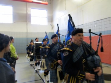 Department of Correction bagpipers and drummers opened and closed the dedication.