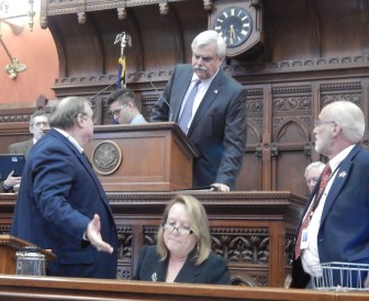 Rep. Bob Godfrey of Danbury presides over the House during Monday's special session.