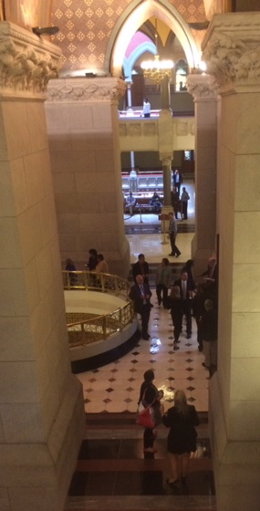 Legislators and staffers outside the Senate, an area from which lobbyists are banned.