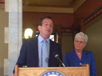 Gov. Dannel P. Malloy announcing proposed budget changes with Lt. Gov. Nancy Wyman.
