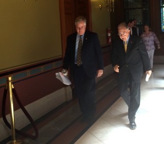 House Speaker J. Brendan Sharkey and Senate President Pro Tem Martin Looney on their way to a press conference after learning of Malloy's plan.