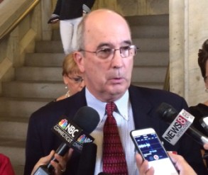 Joseph F. Brennan, president and CEO if the Connecticut Business and Industry Association, speaks to reporters after Gov. Malloy's press conference.