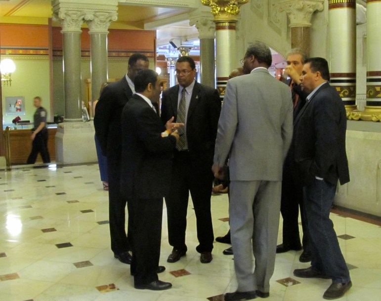 The Black and Latino Caucus outside the House, talking about "An Act Concerning Excessive Force."
