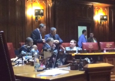 Senate Minority Leader Len Fasno, standing at center, with colleagues during Second Chance debate.