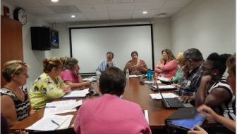 The Community Care Team brainstorms about care plans for some of its 208 clients.
