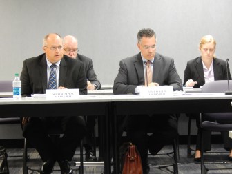 Golden Rule Senior Actuary Scott Westphal, left, and attorney Sam Caligiuri.