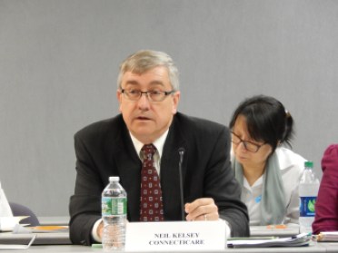 Neil Kelsey, ConnectiCare's chief actuary, testifies on the company's rate proposal at a hearing.