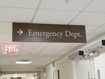 This is a picture of a sign pointing to the emergency department at Middlesex Hospital.