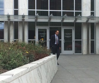 George Gallo leaving court after being sentenced in a campaign kickback case.