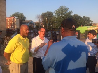 Rep. Douglas McCrory and Gov. Dannel P. Malloy outside a community meeting on violence called by Luke Bronin.
