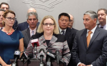 This is a picture of Connecticut Hospital Association CEO Jennifer Jackson, center, during a press conference with House Minority Leader Themis Klarides and Senate Minority Leader Len Fasano.