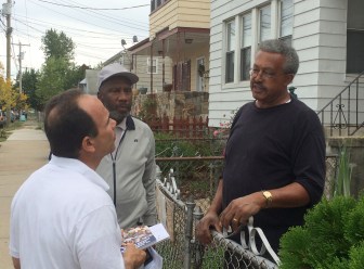 Vernon Marsh, right, owner of three residential properties on Wilmot Avenue in the East End, complained about his property taxes. Tom Coble, a neighborhood activist, accompanied Ganim.