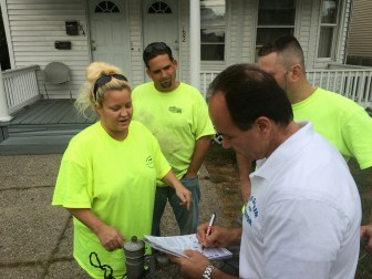 Ganim registers Tara Albuquerque as a voter. She had been stricken from the voter rolls after a criminal conviction.