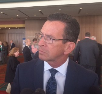 Gov. Dannel P. Malloy listening to a reporter's question Tuesday.