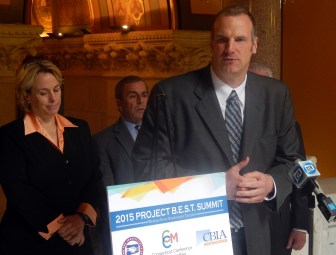 Lori Pelleiter and Joe Brennan speaking Tuesday at the State Capitol.