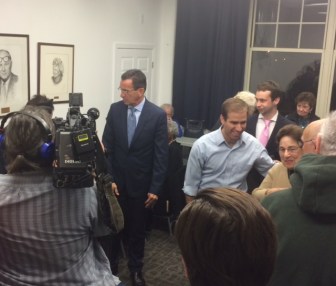 Gov. Dannel P. Malloy and Luke Bronin drop in on Democratic campaign workers Monday night.