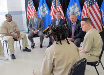 From left, Robert Smith, Warden John Tarascio, Gov. Dannel P, Malloy, Commissioner Scott Semple, Adam Lincoln and Hiram McReynolds.