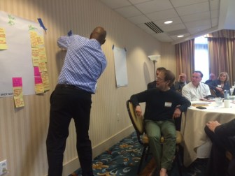 Kenya Rutland, a meeting facilitator, during a brainstorming session.