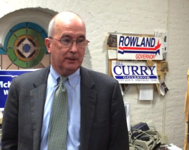 Joseph F. Brennan, president and CEO of the Connecticut Business and Industry Association, talks to reporters Monday.
