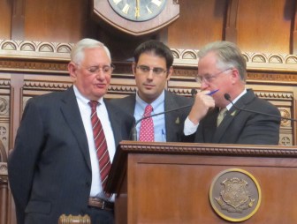 House Speaker J. Brendan Sharkey consults with legal staff, Rick Baltimore and Robert Frankel, over a GOP rules challenge.