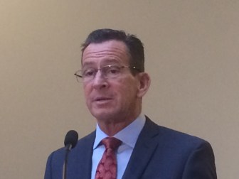 Gov. Dannel P. Malloy talking to reporters Friday.
