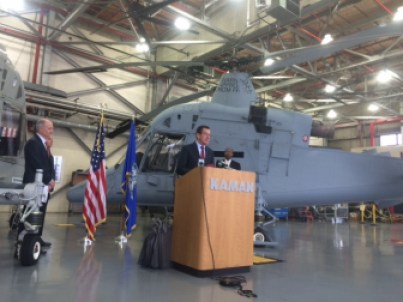 Gov. Dannel P. Malloy and the K-MAX. At left is Neal Keating, the company's president.