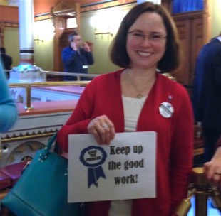 Jennifer J. Gross, executive director of the Eastern Regional Mental Health Board, shows her support for maintaining mental health funding.