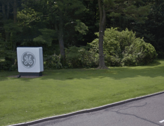 The GE logo marks the entry to its headquarter campus in Fairfield.