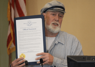 Terry Backer accepting a proclamation in 2012.