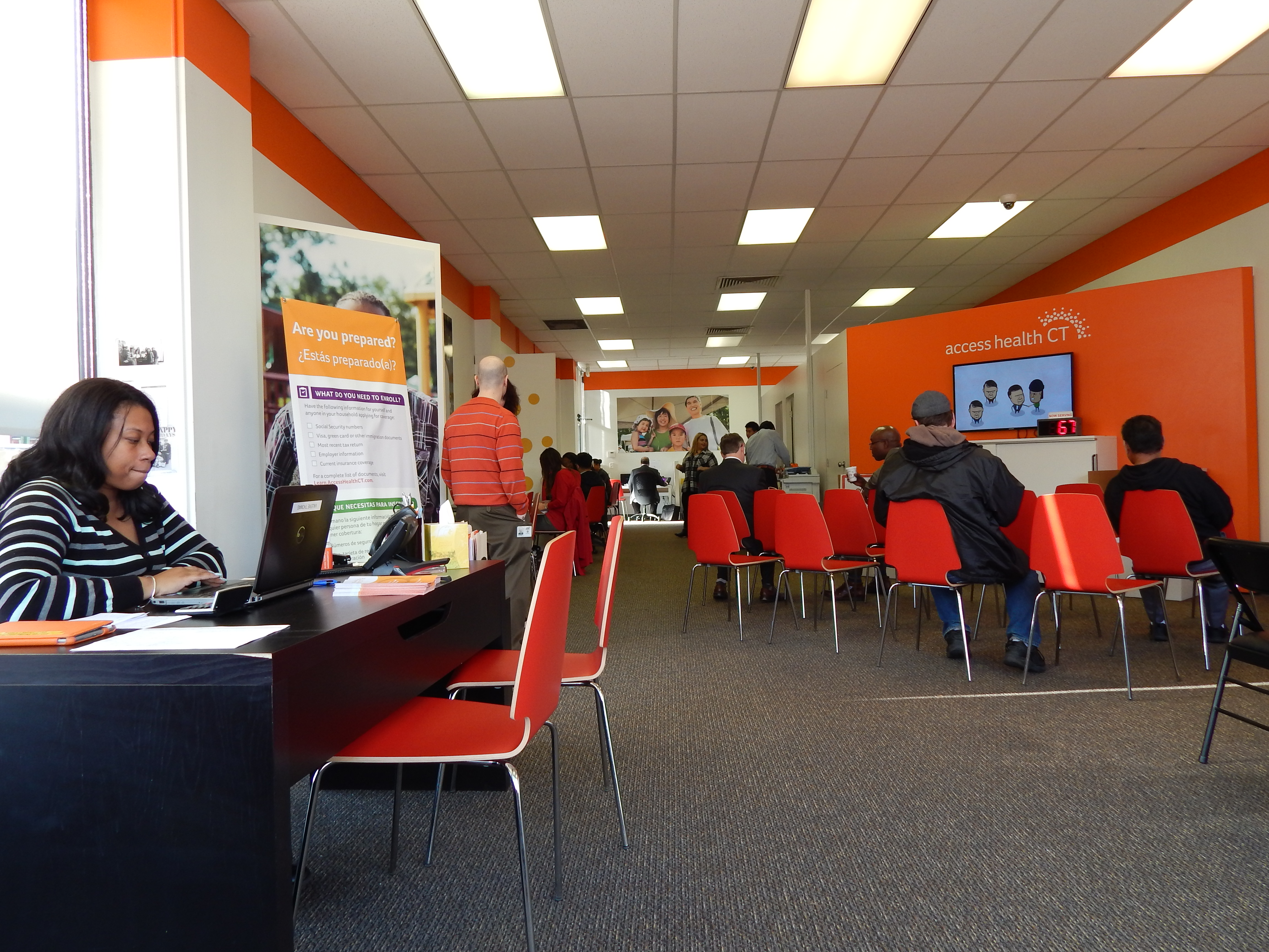 The Access Health CT storefront in New Britain shortly after 10 a.m. Most of those in the waiting area were exchange staff.