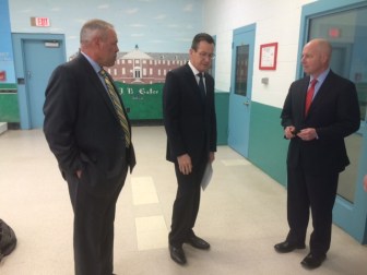 Gov. Dannel P. Malloy, on a recent prison visit, flanked by Scott Semple, left, and Michael P. Lawlor.