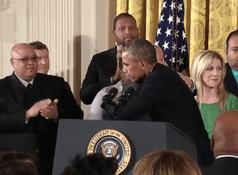 Preside Obama embraces Mark Barden, whose son was killed at Newtown.