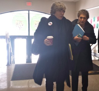 AFT President Randi Weingarten, left, walks into an elementary school in Hartford.