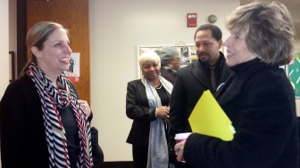 AFT President Randi Weingarten, right, talks with the superintendent of Hartford during a vist to an elementary school in Hartford.