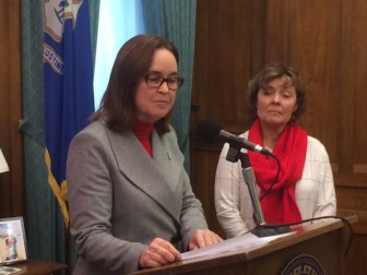 Secretary of the State Denise Merrill, left, with Cheri Quickmire of Common Cause.