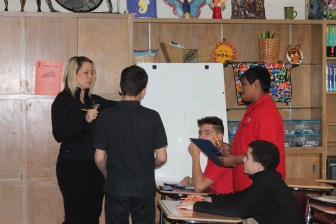 Students are taught a lesson in a class for English Language Learners at East Hartford Middle School