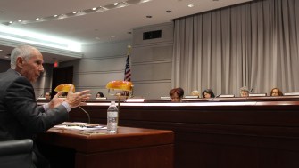 Board of Regents President Mark Ojakian addresses the legislature's Appropriations Committee.