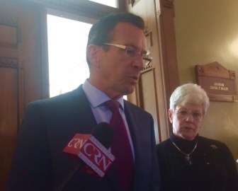 Gov. Dannel P. Malloy addressing reporters Tuesday. At right is Lt. Gov. Nancy Wyman.