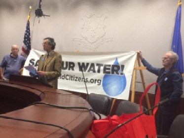 Bradley Kein, center, and David Mann, right.