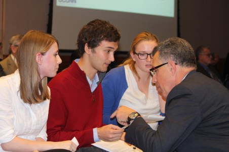 Students at UConn share their concerns about research investments at UConn with the executive vice president for research after a recent Board of Trustees meeting