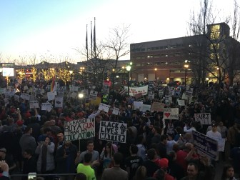 Protesters block Trump supporters as they exit the Connecticut Convention Center.
