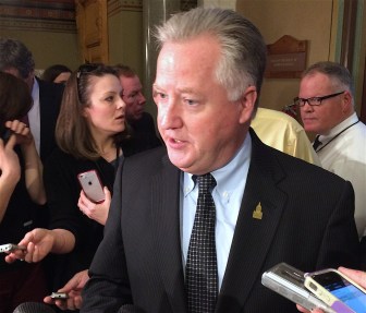 House Speaker J. Brendan Sharkey talks to reporters Tuesday.