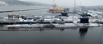 An aerial view of attack submarines USS Virginia, bottom, and USS Connecticut at the Groton submarine base in 2007.
